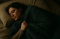 A calming bedroom scene with an autistic adult resting underneath a HeyASD sensory blanket. The atmosphere feels warm, safe and peaceful. 